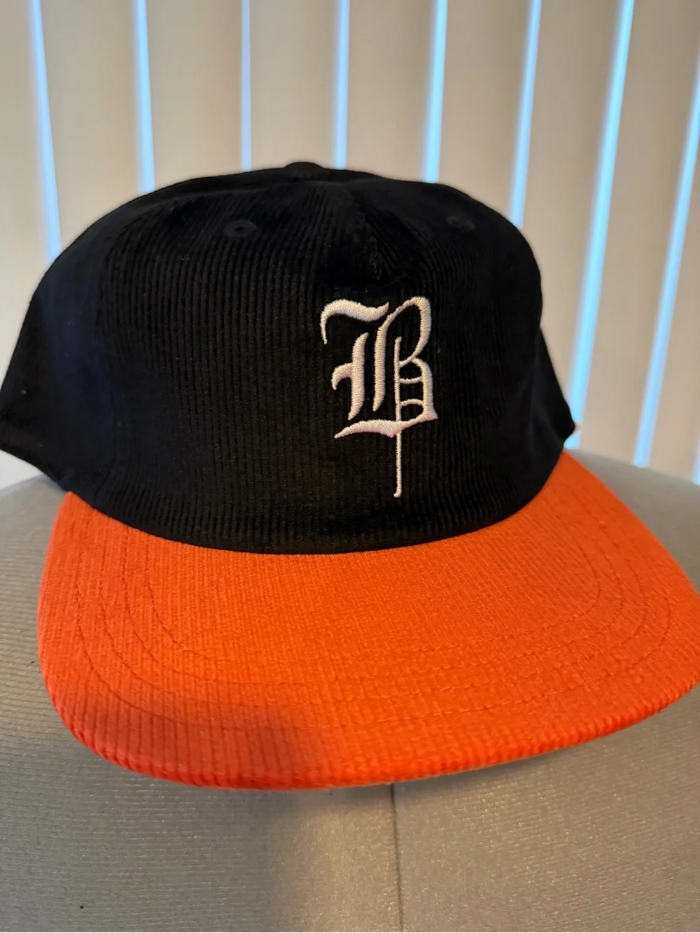 BLVCKSCALE -  Black and Orange Corduroy Baseball Cap with White Gothic 'B'
